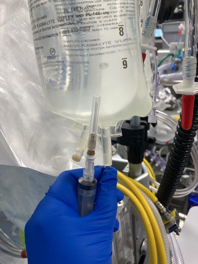 Iv fluid and filtered needle
